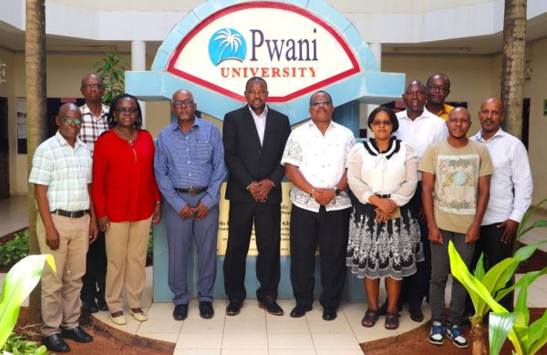 Group photo with the Chairman of KNATCOM Board, Prof. Mohamed Rajab, Ph.D, E.B.S and the Ag. Secretary General/CEO-KNATCOM Dr. James Njogu, HSC at Pwani University and a section of staff members from the University and KNATCOM.