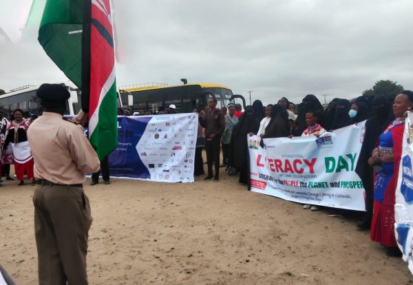 County Commissioner Michael Yator Flagging off the Adult Learners procession during the world literacy Day in Kajiado
